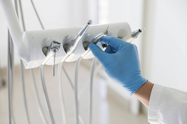 Professional Tooth Extraction technician working in Newcastle, OK
